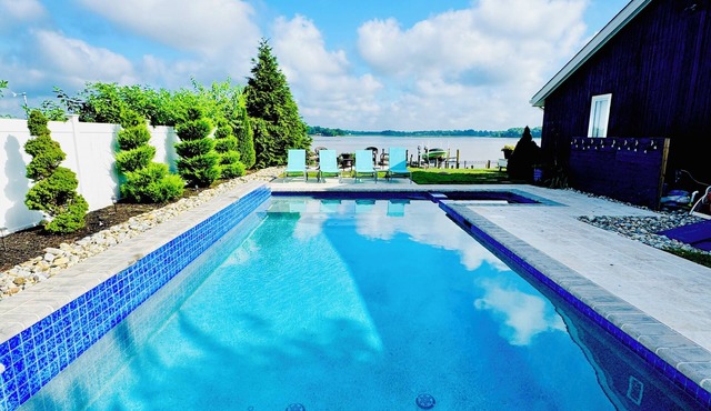 Breathtaking Waterfront Property w/pool and private dock. Relax and unwind.
