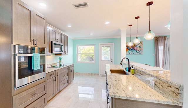 Brick beauty with private yard, BBQ, patio, AC, & W/D