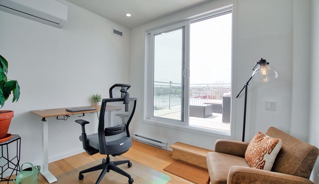 Bright 2-Floor Penthouse Condo with Parking