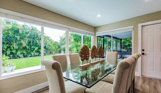 Bright, 3BR Escape with Tropical Yard & Patio in WPB – Sleeps 9, Pets, Parking!