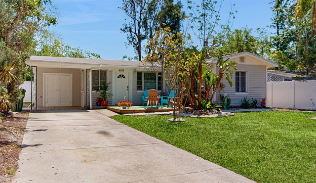 Bright, airy and centrally located with fenced yard, dog friendly, close to Gulf