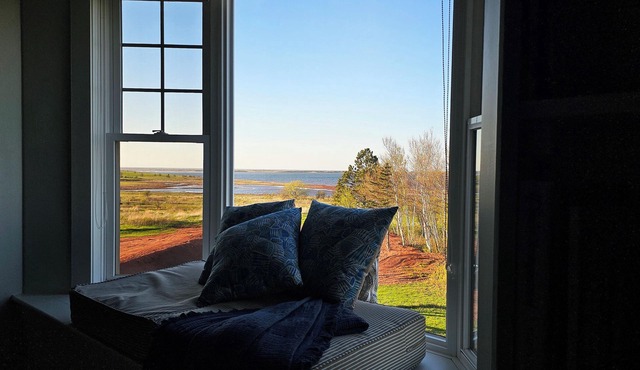 Bright & Airy Beach House – Bay Views, Wraparound Deck & Room to Unwind