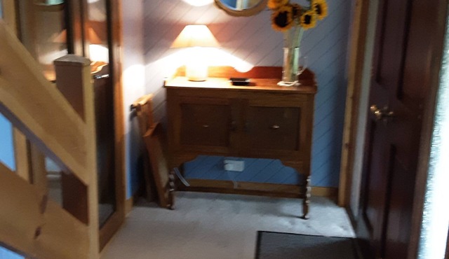 Bright, airy first floor apartment with balcony in rural location