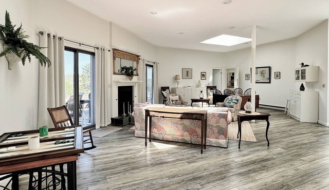 Bright and airy home with sunset views less than a mile to the lake and village