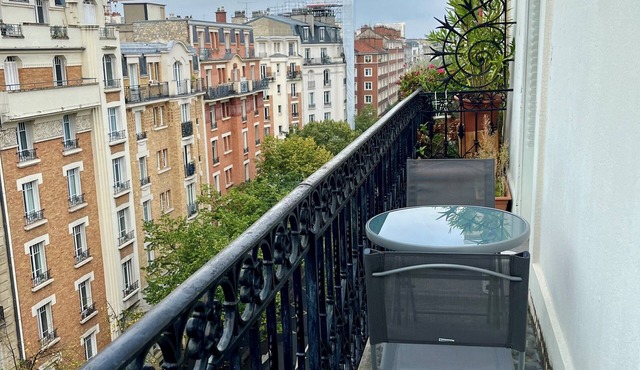 Bright and charming one-bedroom furnished apartment with balcony in Paris.