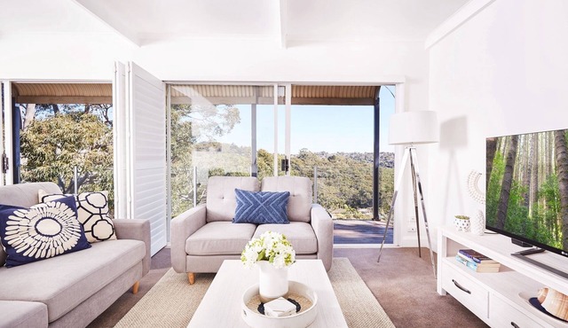 Bright And Spacious Family Home With Leafy Deck