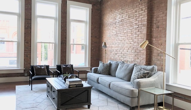 Bright and Spacious Historic Brick Loft off the square in Paola