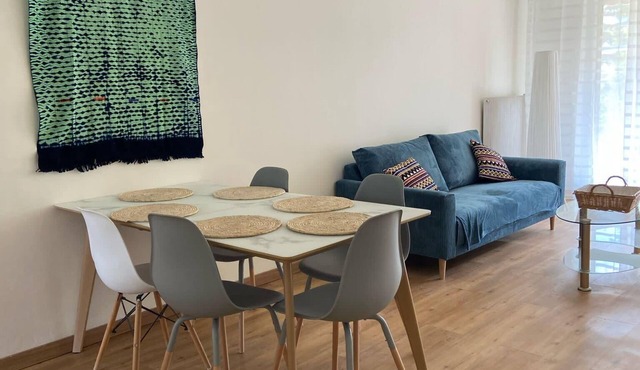 Bright apartment with garden and swimming pool