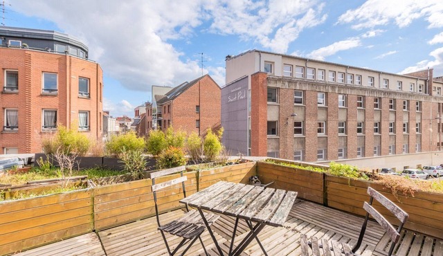 Bright apartment with rooftop and private garage.