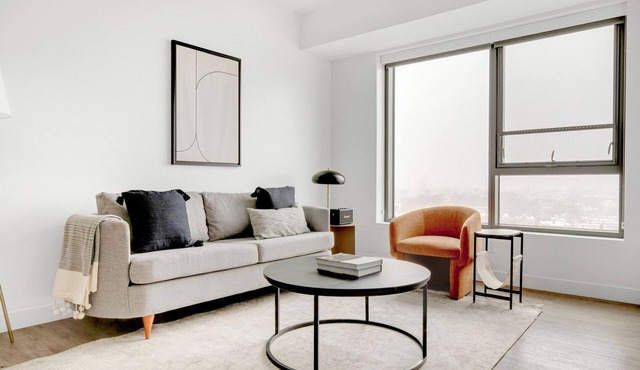 Bright Central Square 1BR w/Gym, W/D & Roof, near T, by Blueground