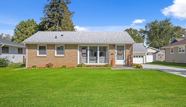 Bright, cozy 3BR ranch in Lake Country with fenced yard and covered patio.