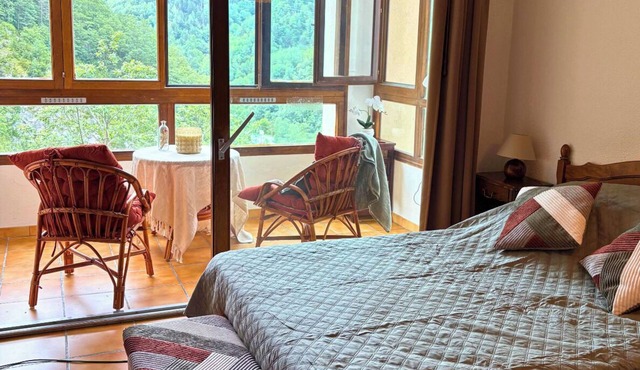 Bright studio with patio and mountain views