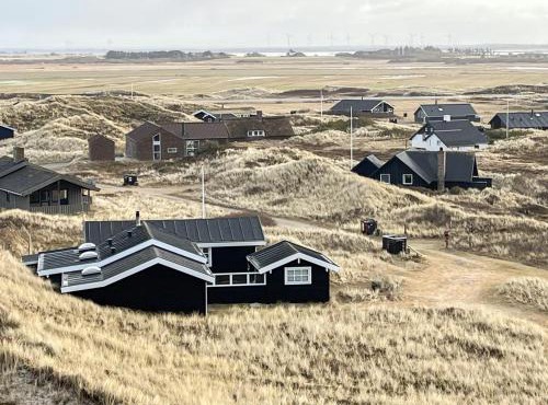 Bright House In Dune Row Near The North Sea