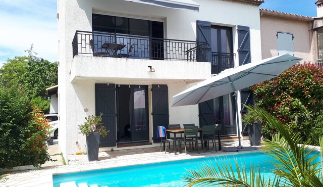 bright house with swimming pool
