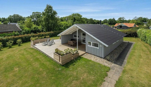 Bright house with sea view and a hot tub on Als