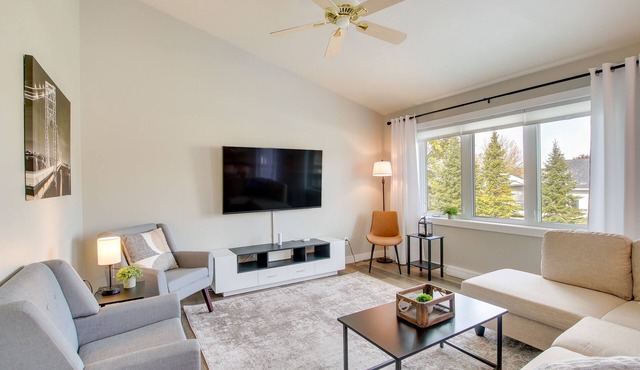 Bright Little Chute Condo w/Deck & Yard!