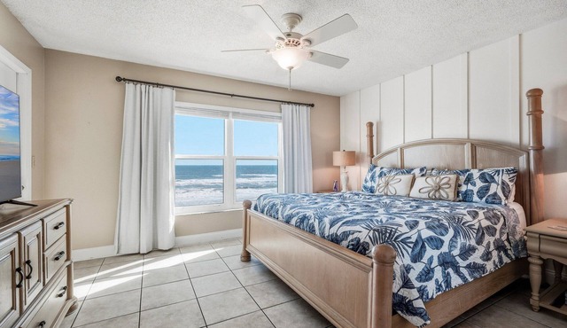 Bright oceanfront corner 2/2 with beach/pool views, large balcony, and multiple pools