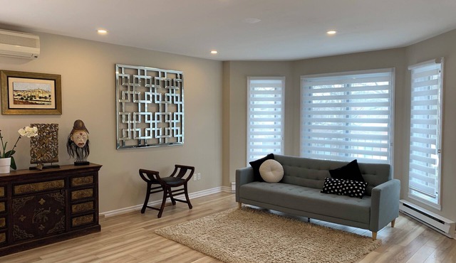 Bright, Renovated & Fully Furnished Condo – Garage + Terrace – 10 min to Metro
