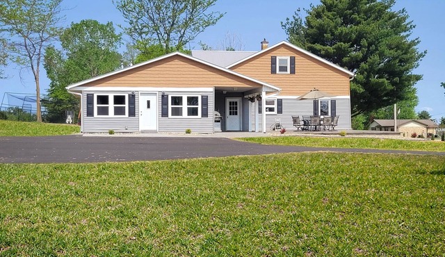 Bring the whole family to this great home with an acre of room for fun.