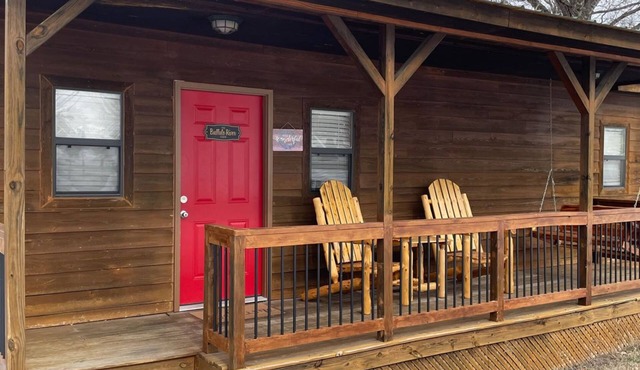 Buffalo River Cabin has 1 bedroom with queen size bed, 1 twin bunk bed in hallway, 1 futon in main l