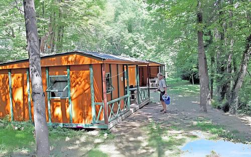 Bungalow confortable à Escaro avec piscine partagée
