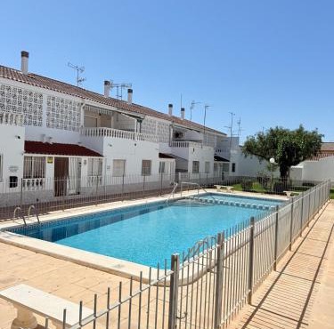 Bungalow with a pool and a terrace