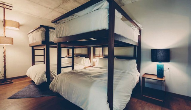 Bunk Suite with Lounge Area and Balcony for 4