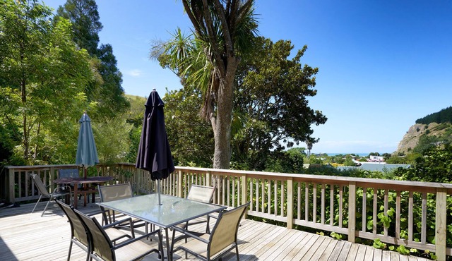 Bush Clad Setting with Beach Views