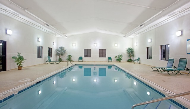 Business District Suite with Pool Access, Free Breakfast + Weekday Shuttle