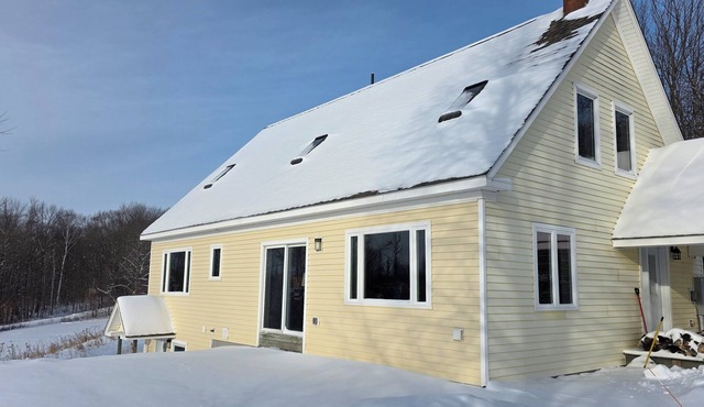 Buttercup Getaway. a 4-bedroom house on 9 acres in East Burke.ski bike & relax