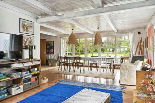 By The Bay A Thatched House Lies So Beautifully