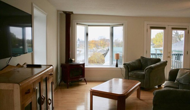 By The Rivers a unique Apartment looking out the St.Lawrence River