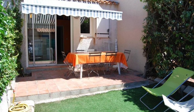 By the sea, house with garden