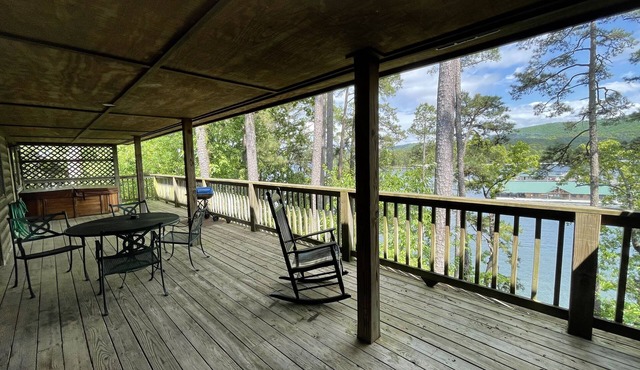 C8, Two bedroom, two bath log-sided, lake view luxury cottage with hot tub by RedAwning