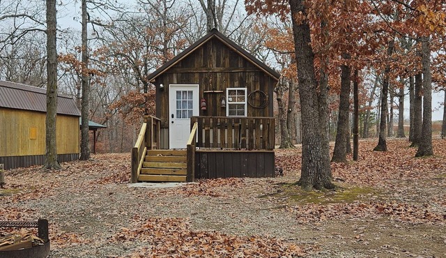 Cabin 1 is a Cozy 2-bedroom cabin outside wonderful Fair Play with AC and heat