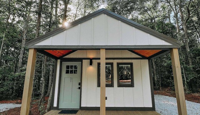 Cabin #1: Studio style layout with kitchenette and a large gravel parking pad beside the cabin for easy boat or trailer storage.