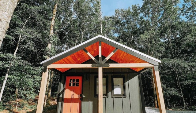 Cabin #10: One bedroom with kitchenette and a large gravel parking pad beside the cabin for easy boat or trailer storage.