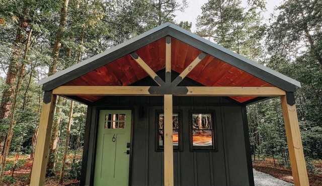 Cabin #6: Studio style layout with kitchenette and a large gravel parking pad beside the cabin for easy boat or trailer storage.