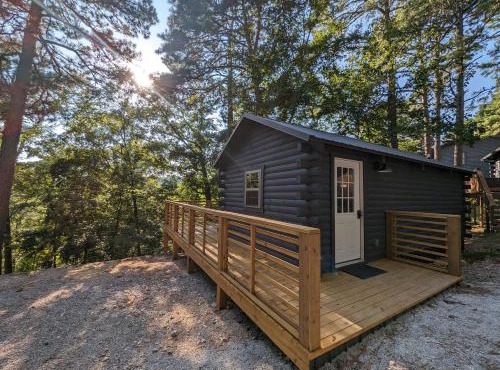 Cabin #6 with hot tub deck and sunset view at Loblolly Pines