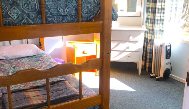 Cabin 9 has two separate rooms & sleeps 4. Guests have access to all amenities