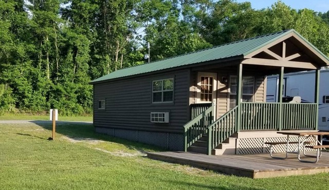 Cabin 9 - The beautifully decorated interior of this cabin is perfect for any outdoor lover.