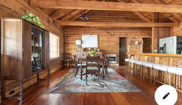 Cabin By the Bay A unique authentic log cabin by the beach with fenced yard