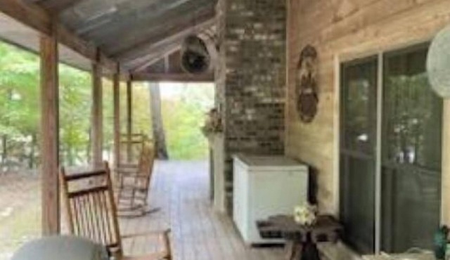 Cabin in the woods overlooking Grenada lake.