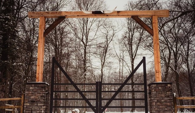 CABIN IN THE woods with pond and trails
