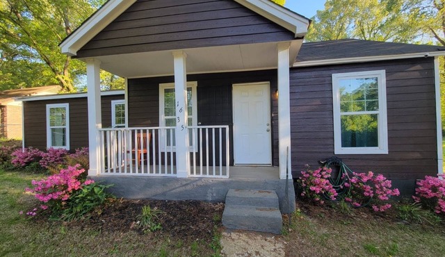 Cabin like over an acre of grounds lots of parking