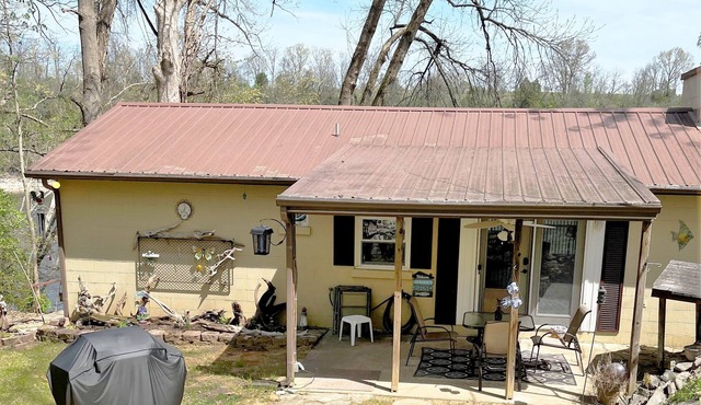 Cabin located on lakeside with accessible boat dock.