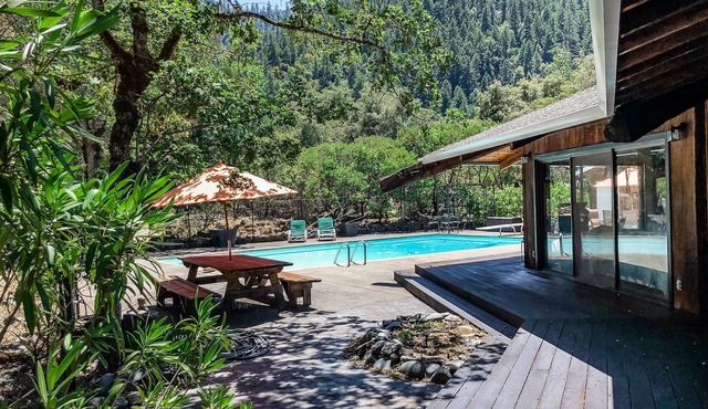 Cabin near the river with private pool, wood-burning fireplace & patio