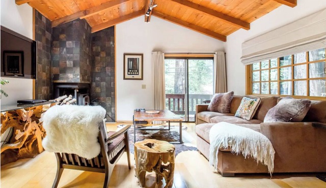 Cabin Nestled in Forested Canyon