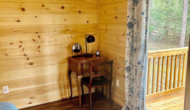 Cabin sitting on 60 acres, minutes from Bryant Denny Stadium