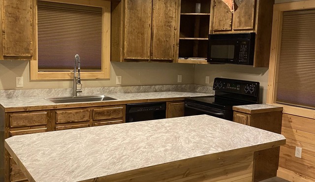 Cabin with peekaboo views of Glacier Park